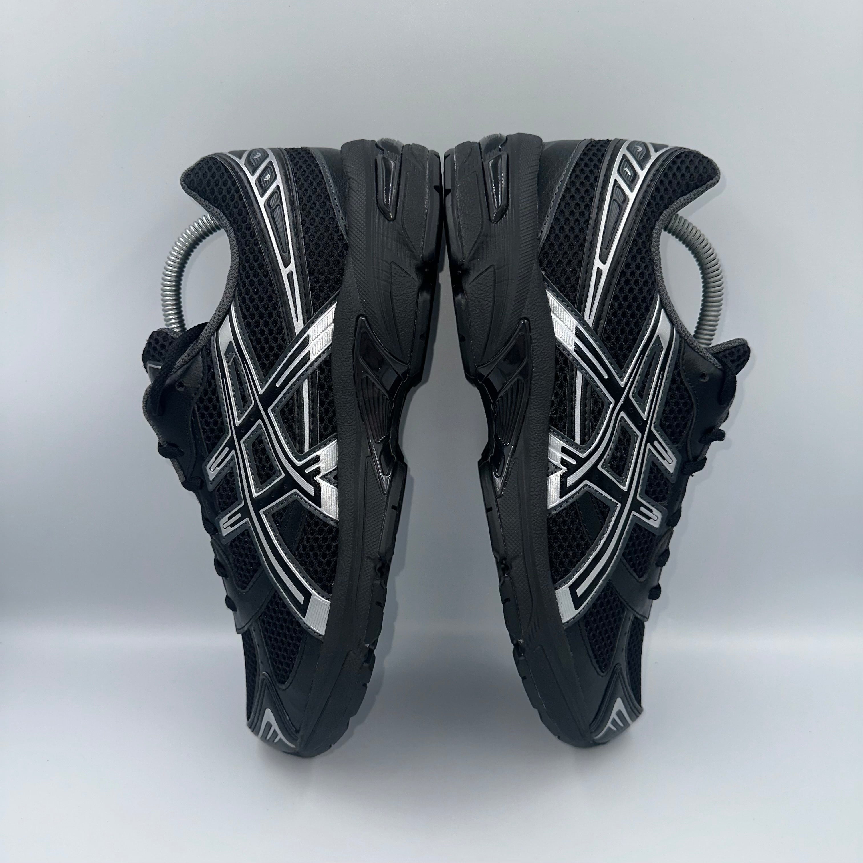 ASICS Gel-1130 Black / Pure Silver three-quarter front angle