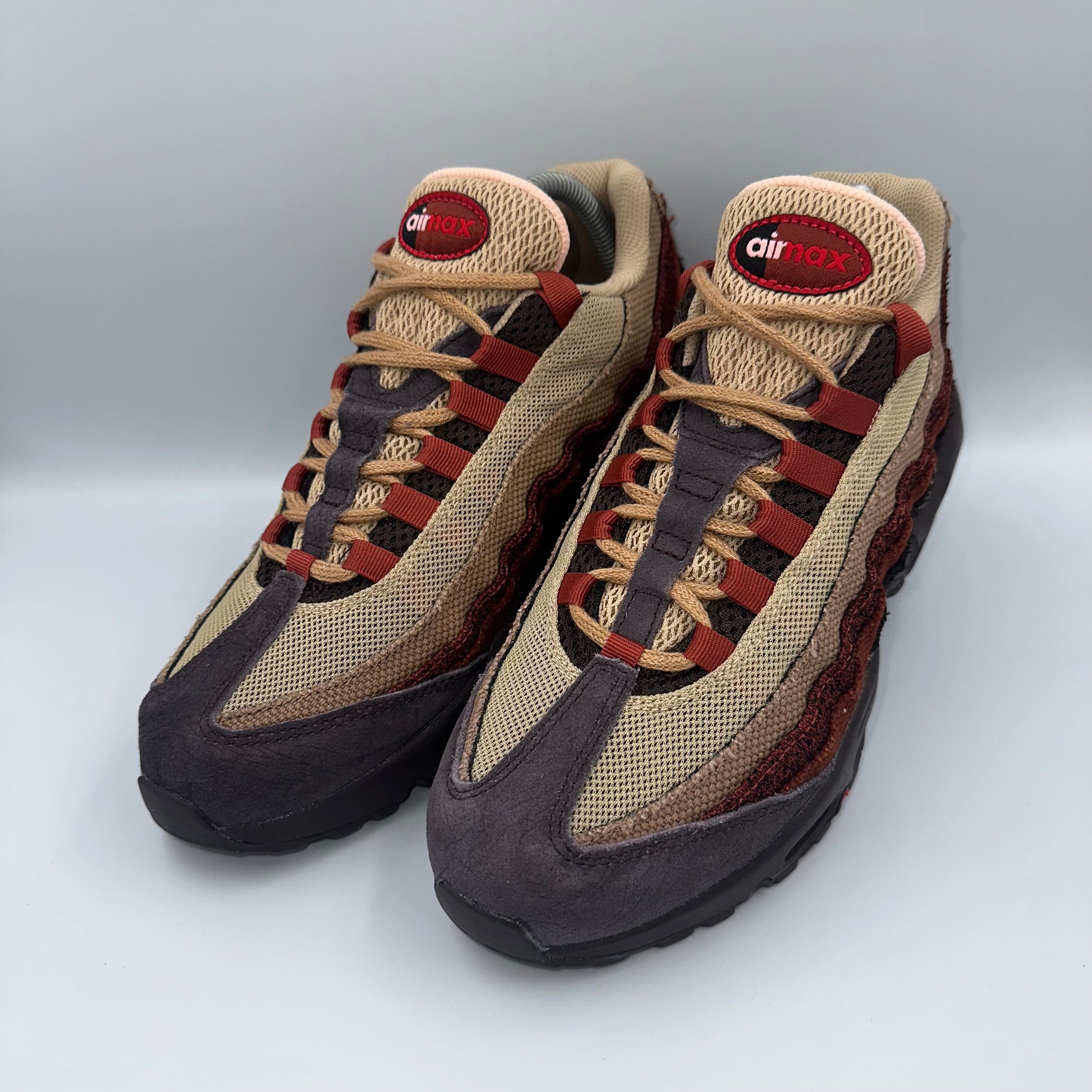 Nike Air Max 95 Anatomy of Air medial side view showing layered upper and Air unit