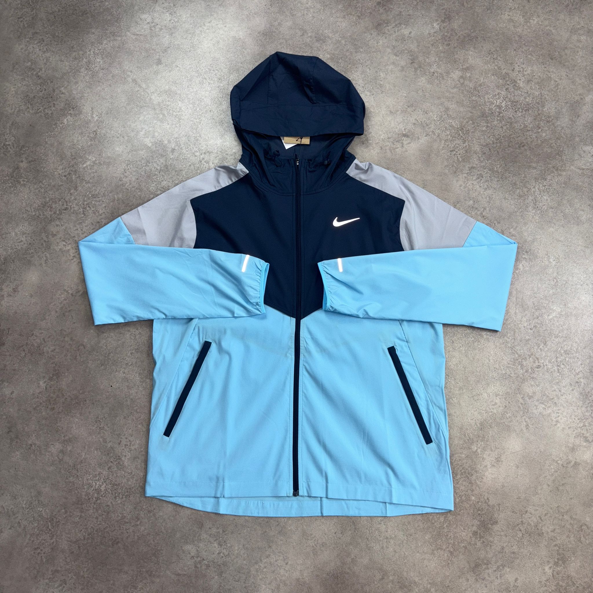 Nike Windbreaker Aqua Blue front view