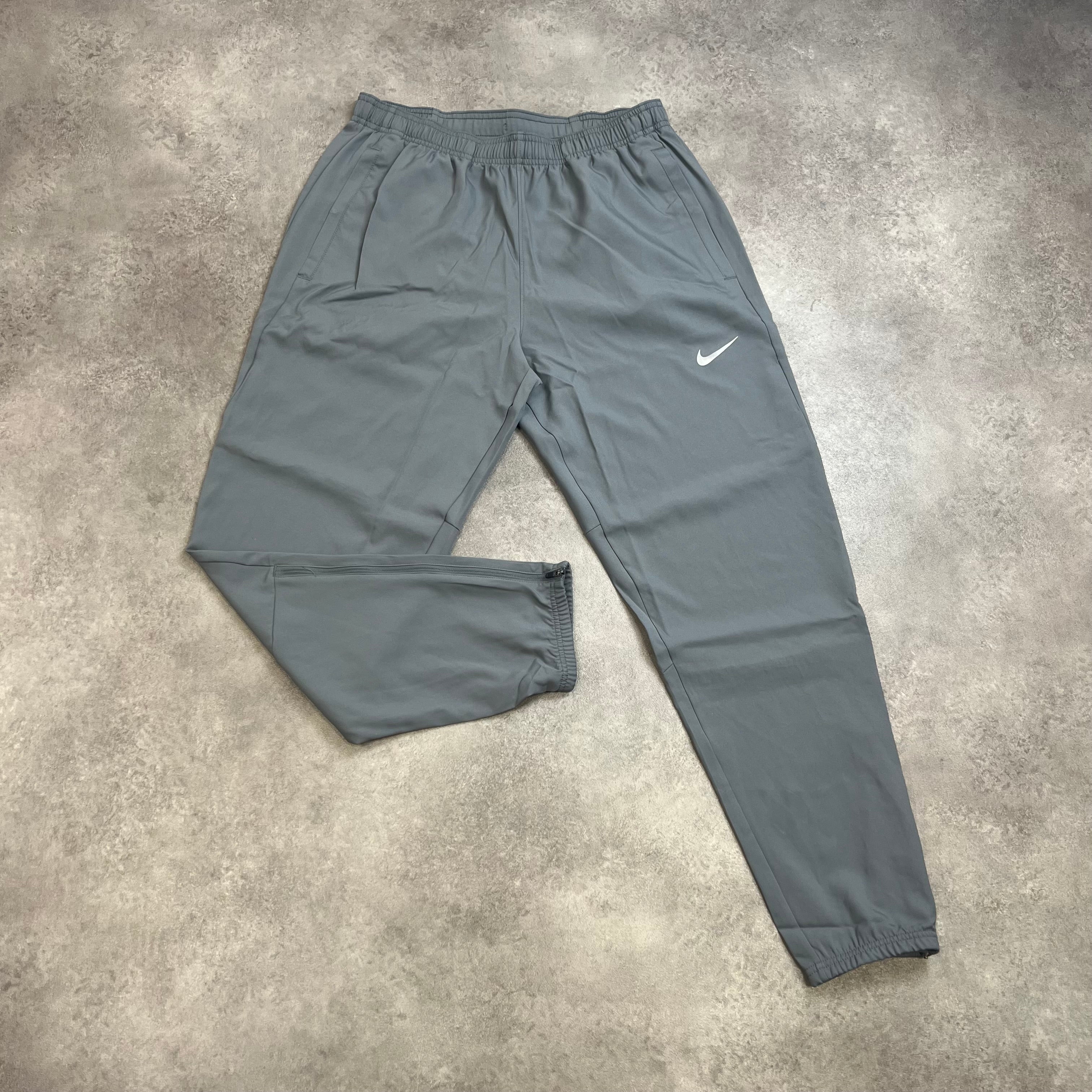 Nike Challenger Pants Smoke Grey front view