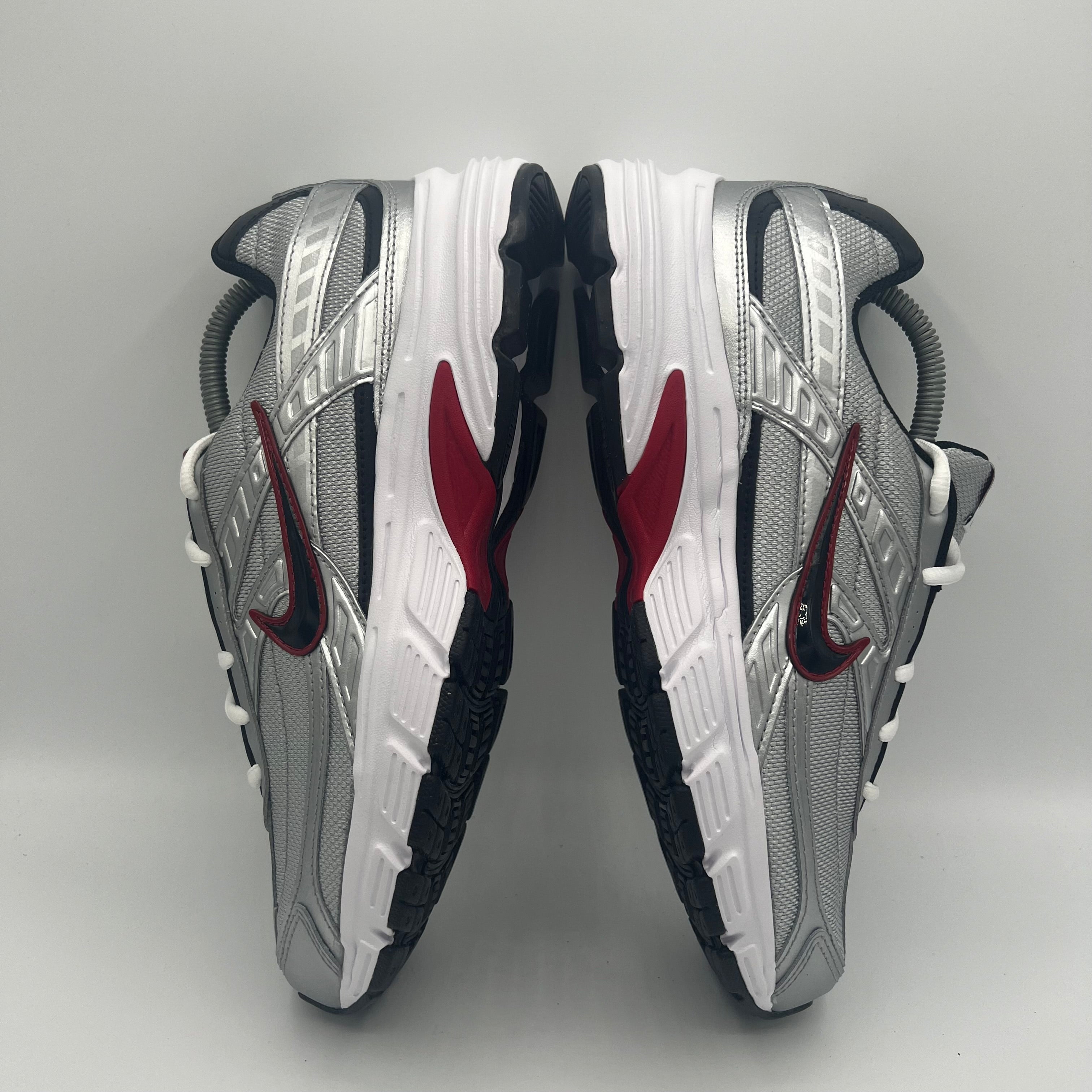 Nike Initiator Metallic Silver / Black/ White three-quarter front angle