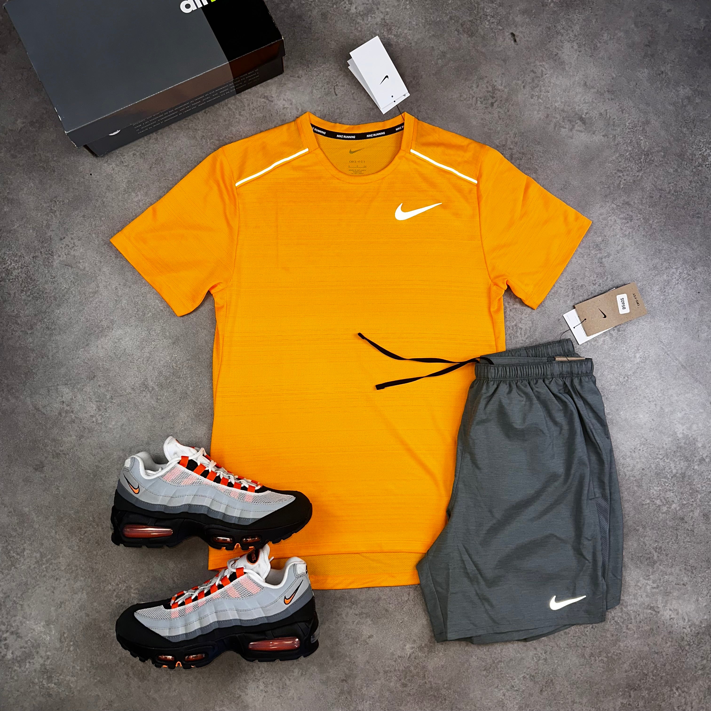 Nike Miler Orange & Challenger Shorts Grey front view