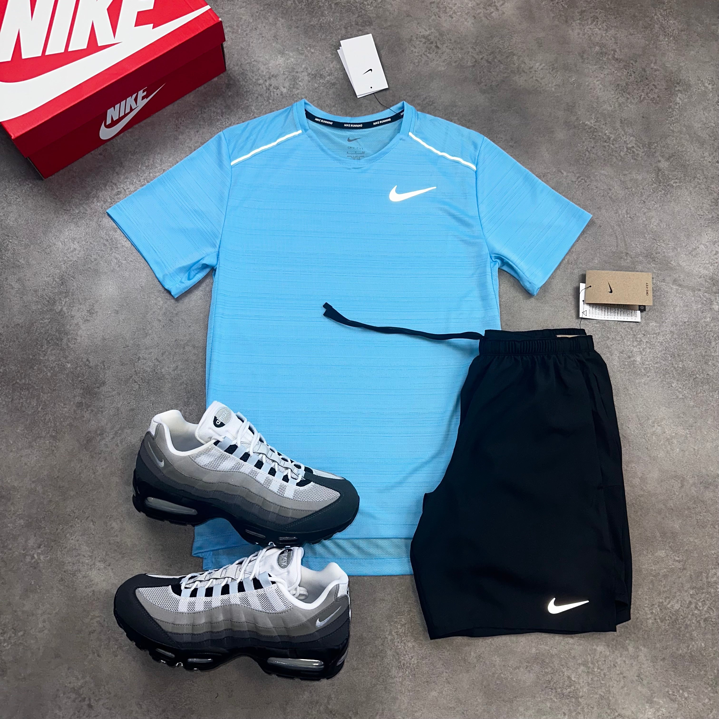 Nike Miler Aquarius Blue & Challenger Black front view