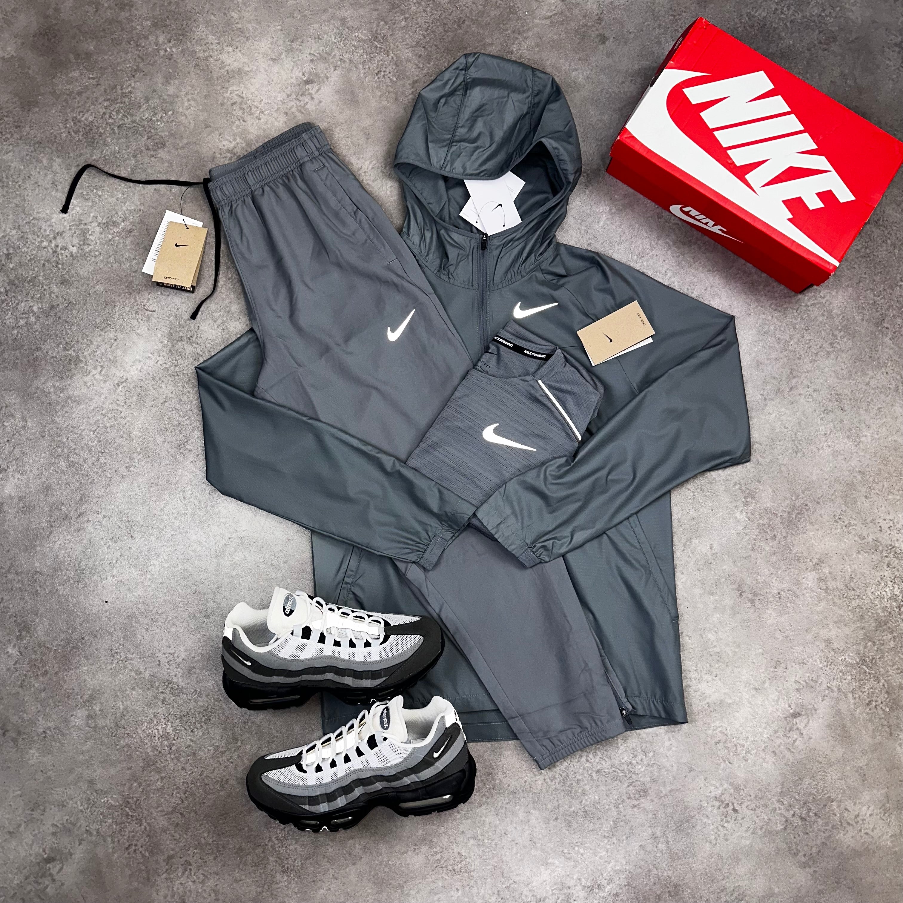 Nike Essential / Challenger Tracksuit Smoke Grey front view