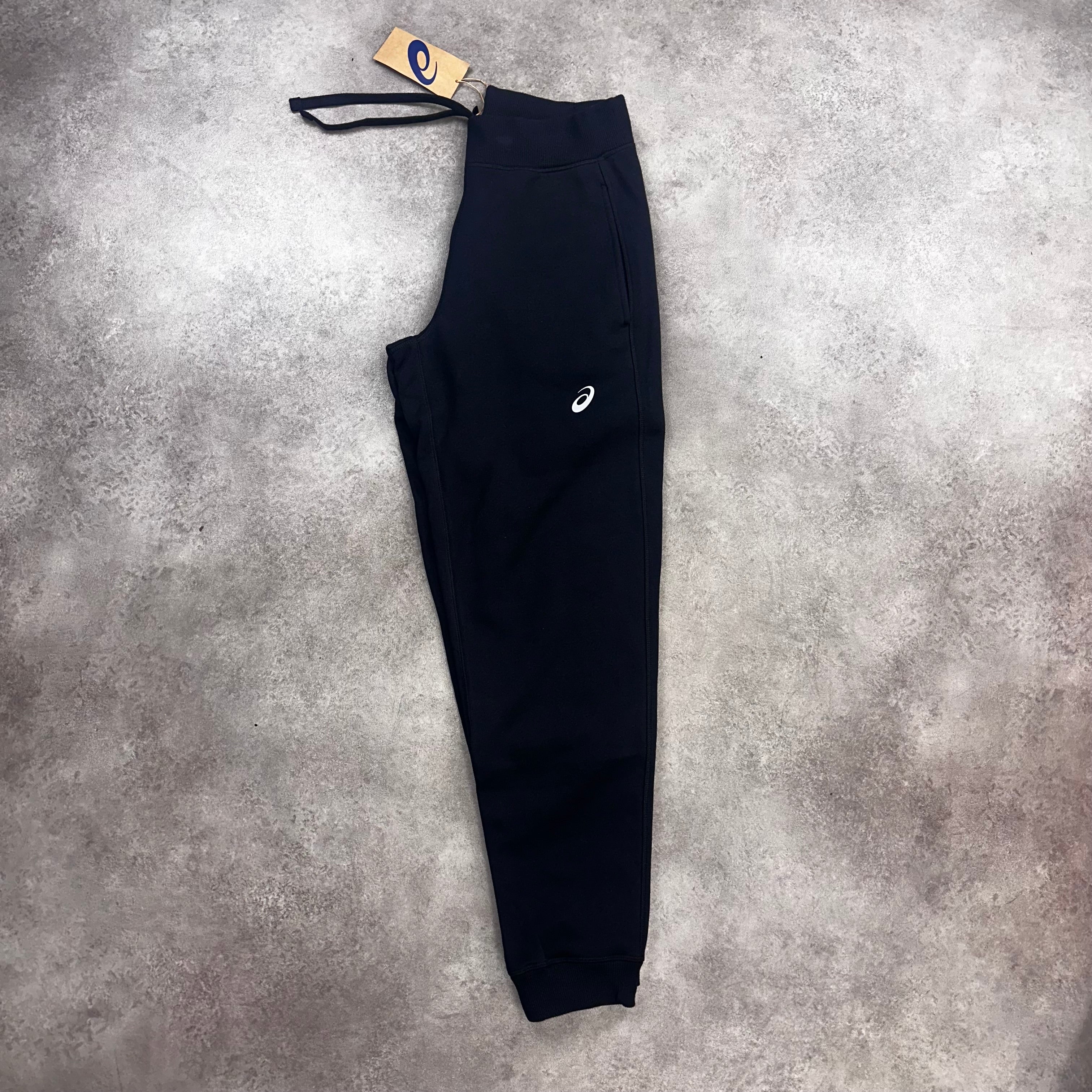 ASICS Tracksuit Black flat lay
