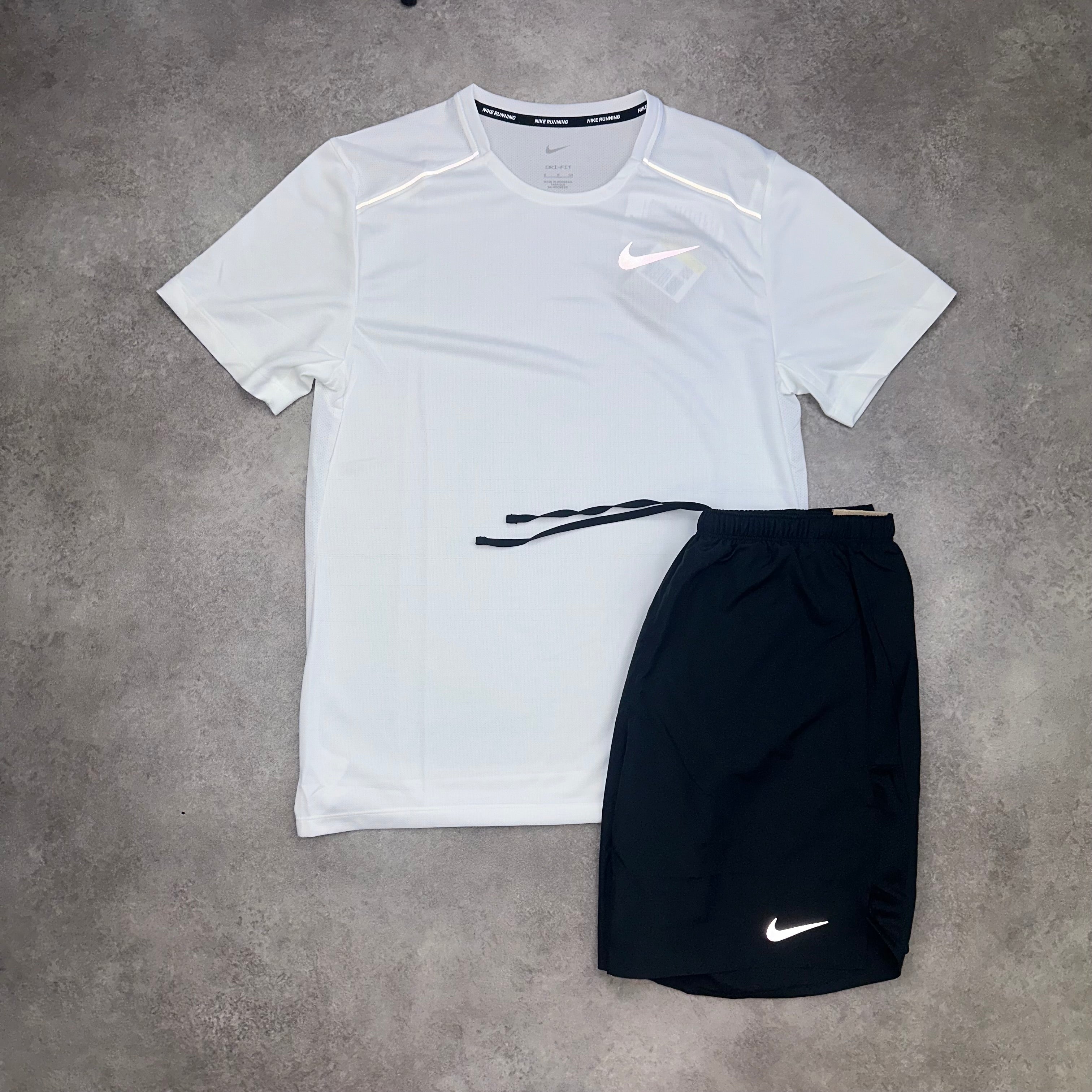 Nike Miler White & Challenger Shorts Black front view