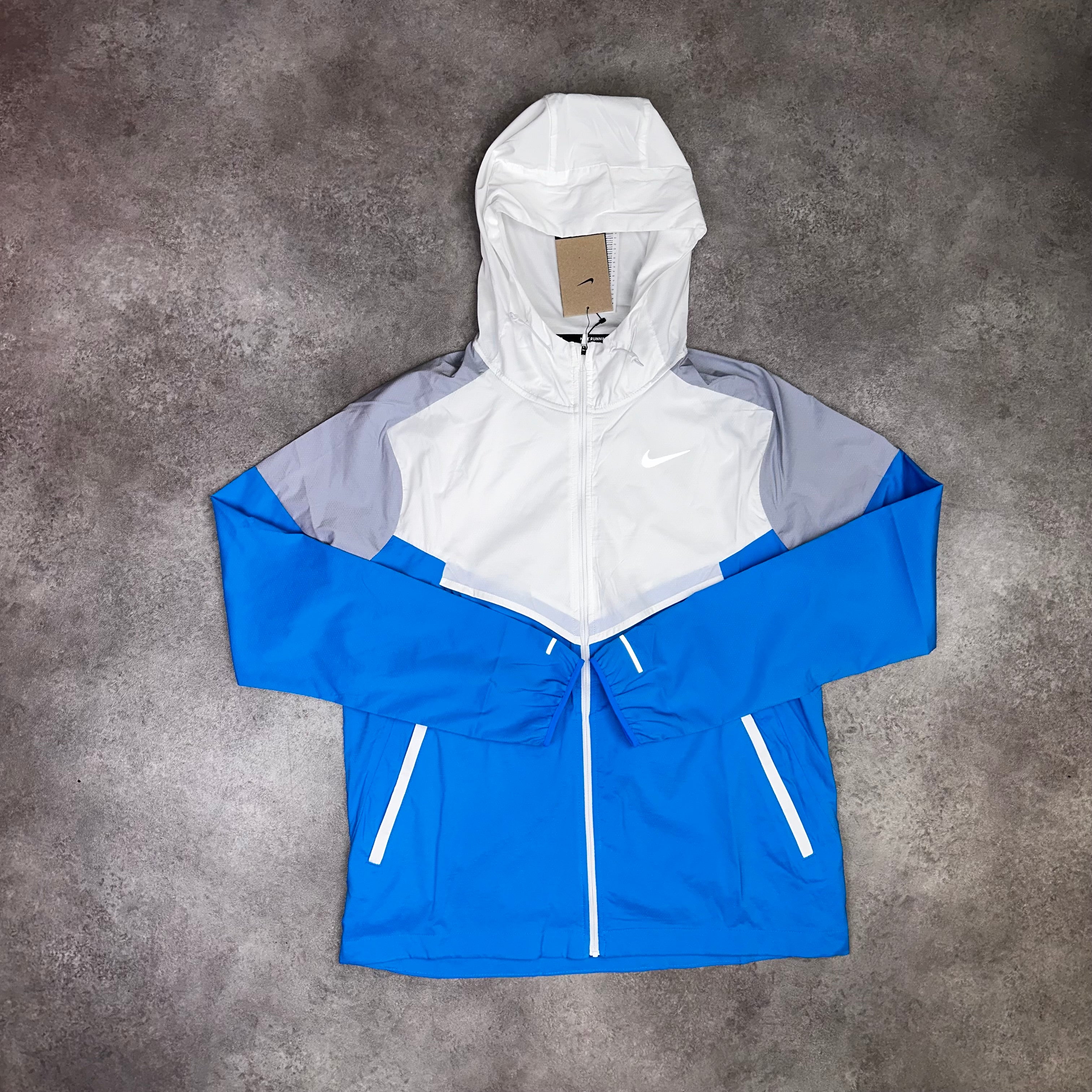 Nike Windbreaker White / Blue Hero front view