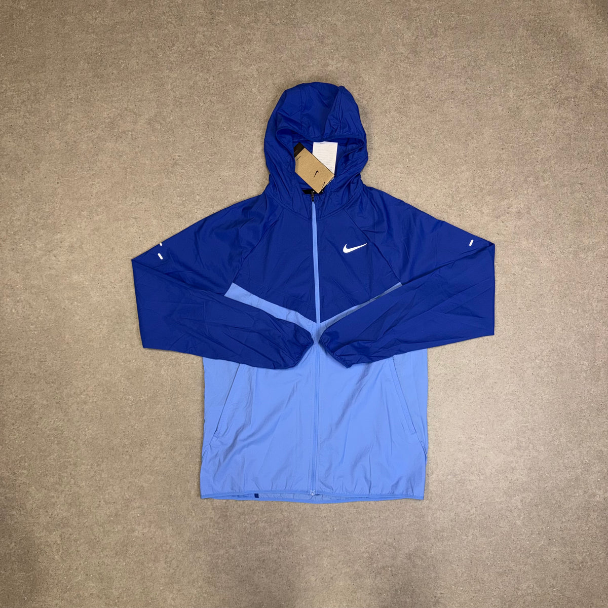 Nike Stride Repel UV Running Jacket – Lapis / Royal Pulse
