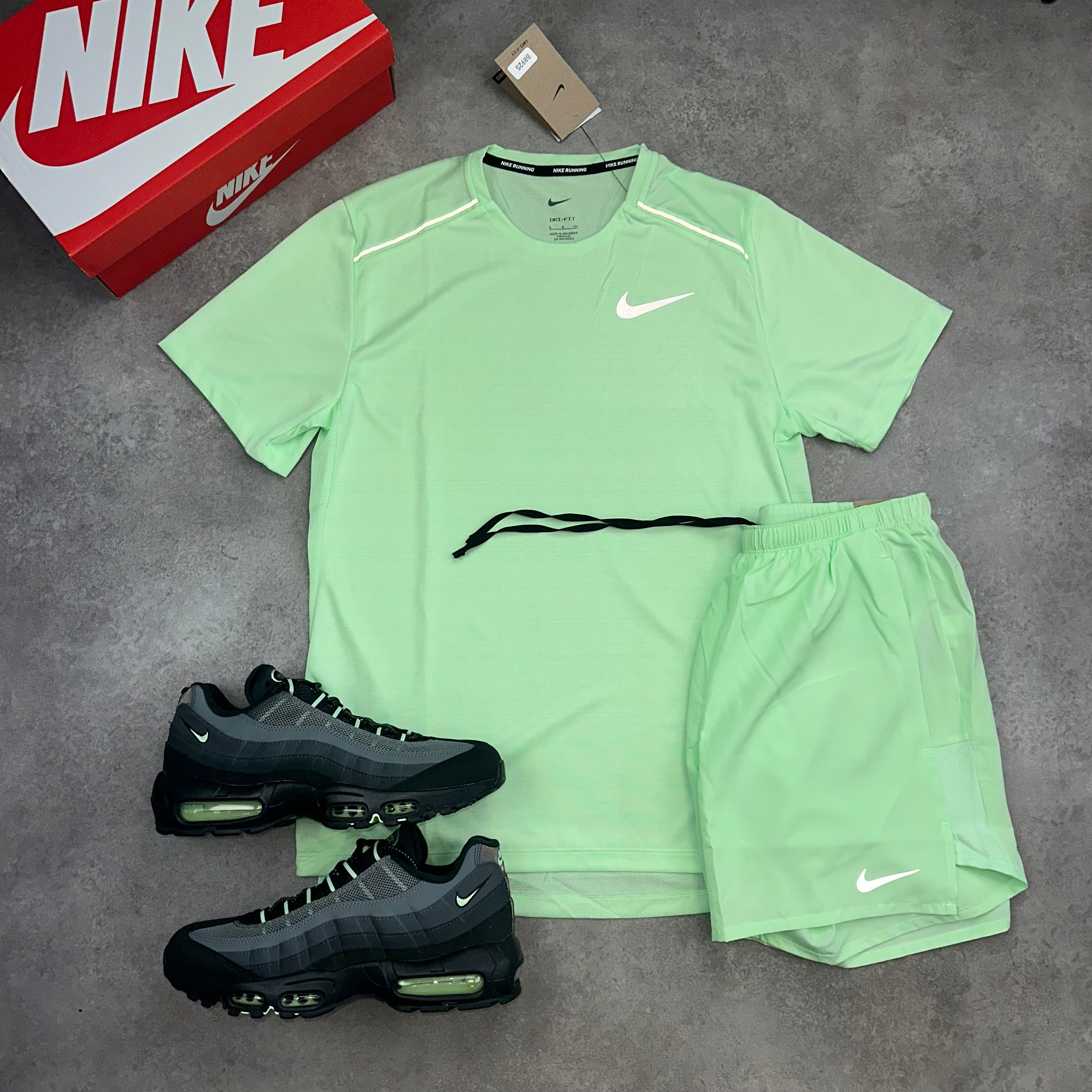 Nike Miler & Challenger Shorts Vapour Green lateral side profile
