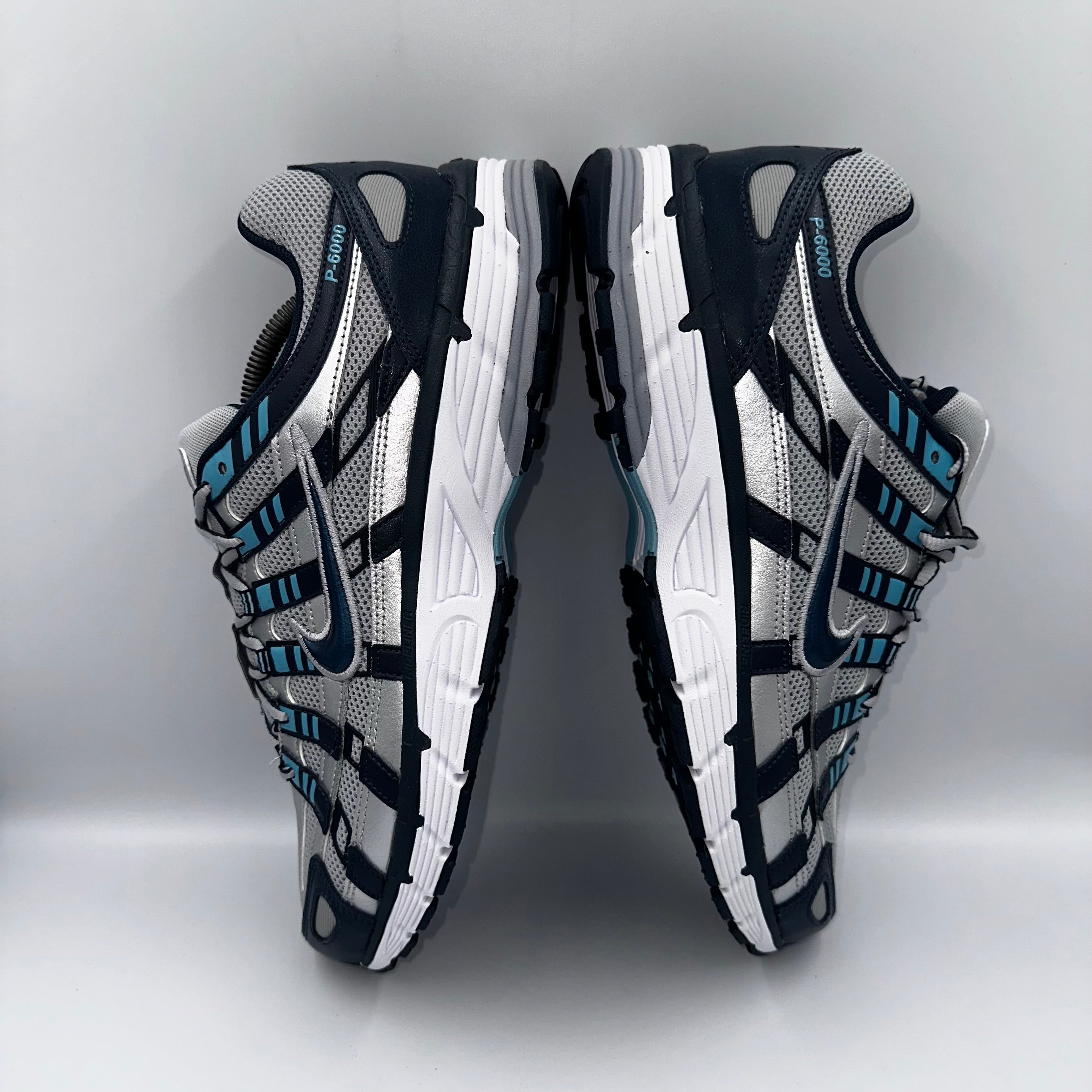 Nike P-6000 Armory Navy / Metallic Silver UK 11 three-quarter front angle