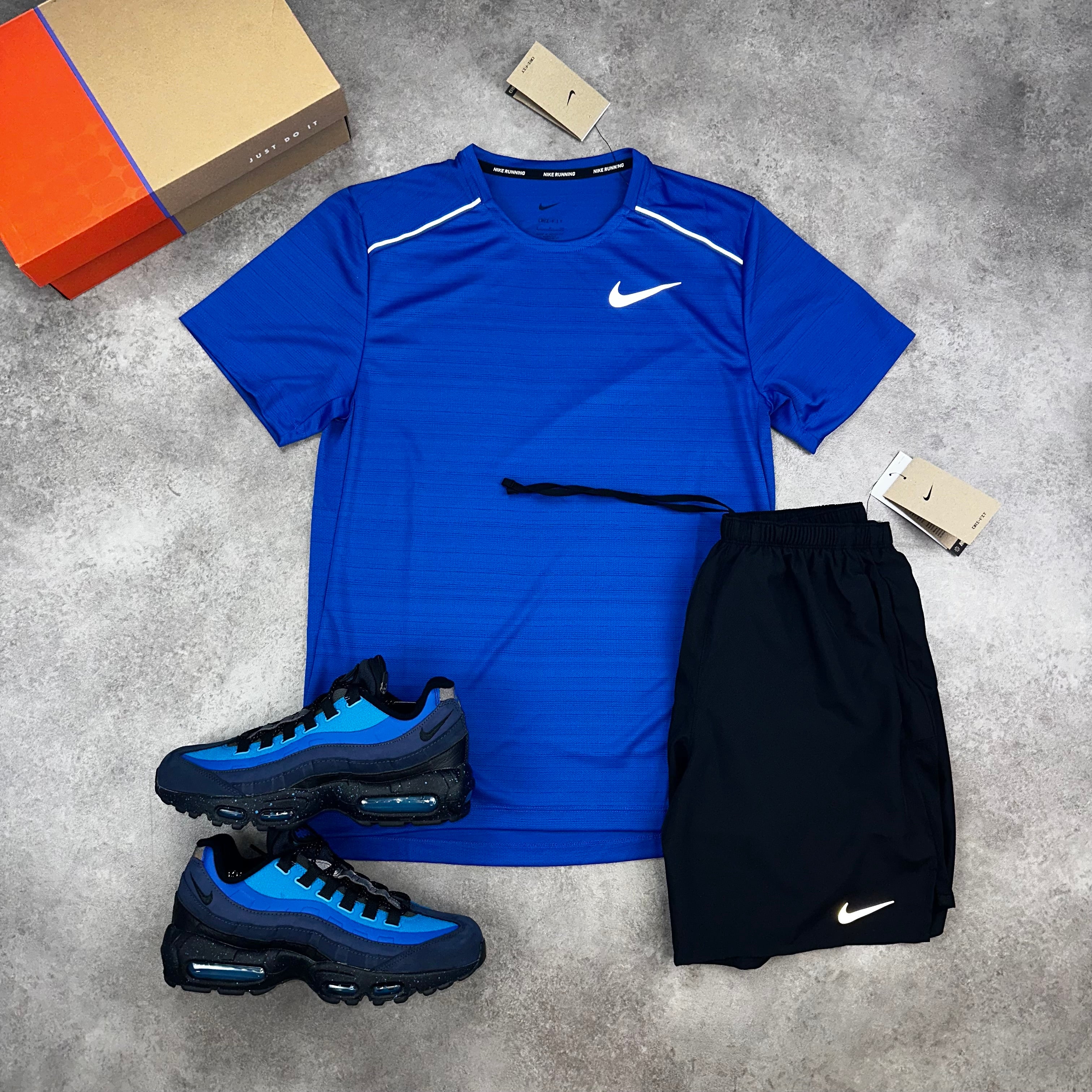 Nike Miler Royal Blue & Challenger Shorts Black front view