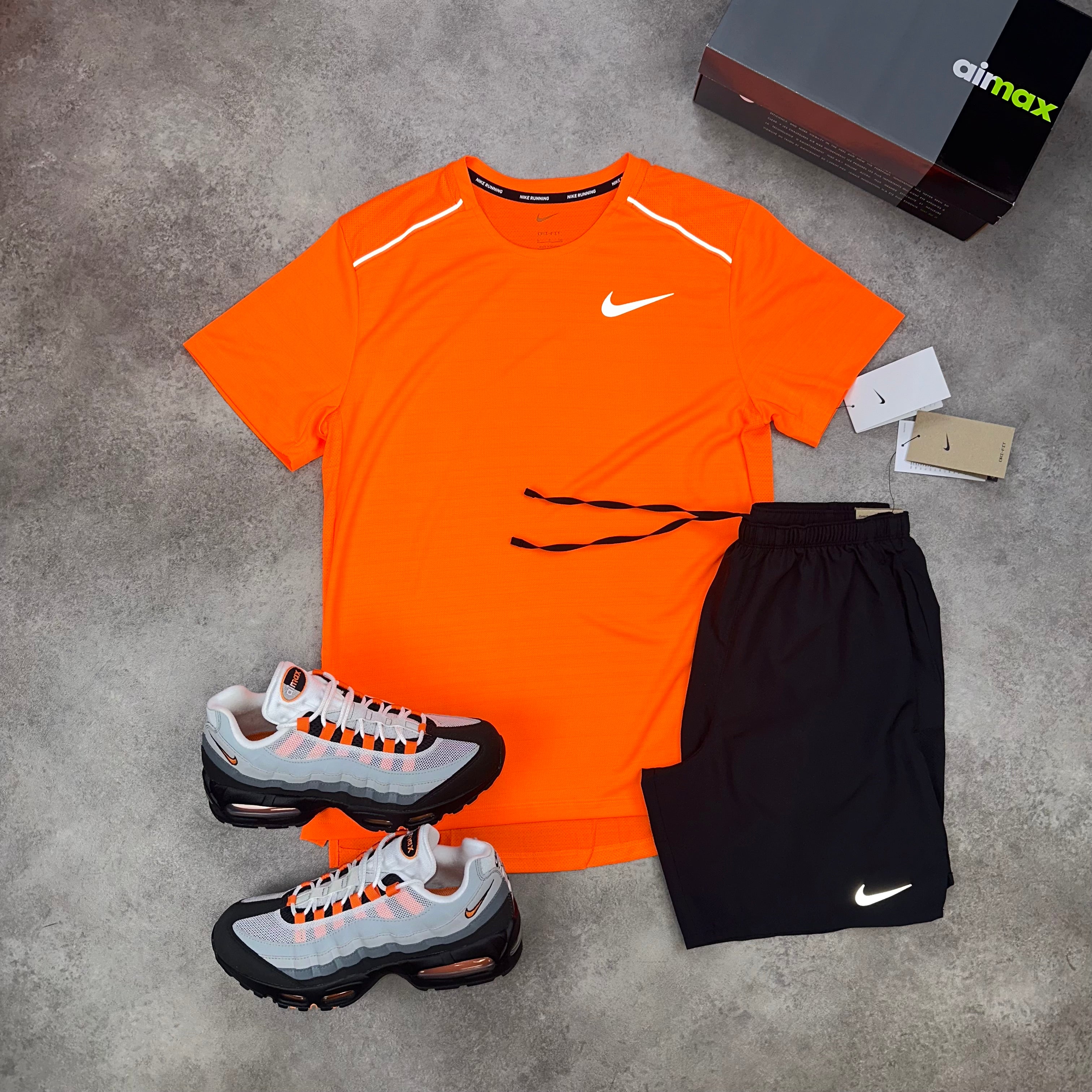 Nike Miler Total Orange & Challenger Shorts Black front view